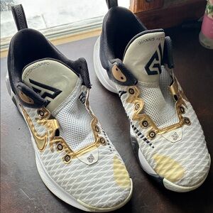 Nike White and Gold Athletic  championship shoes!